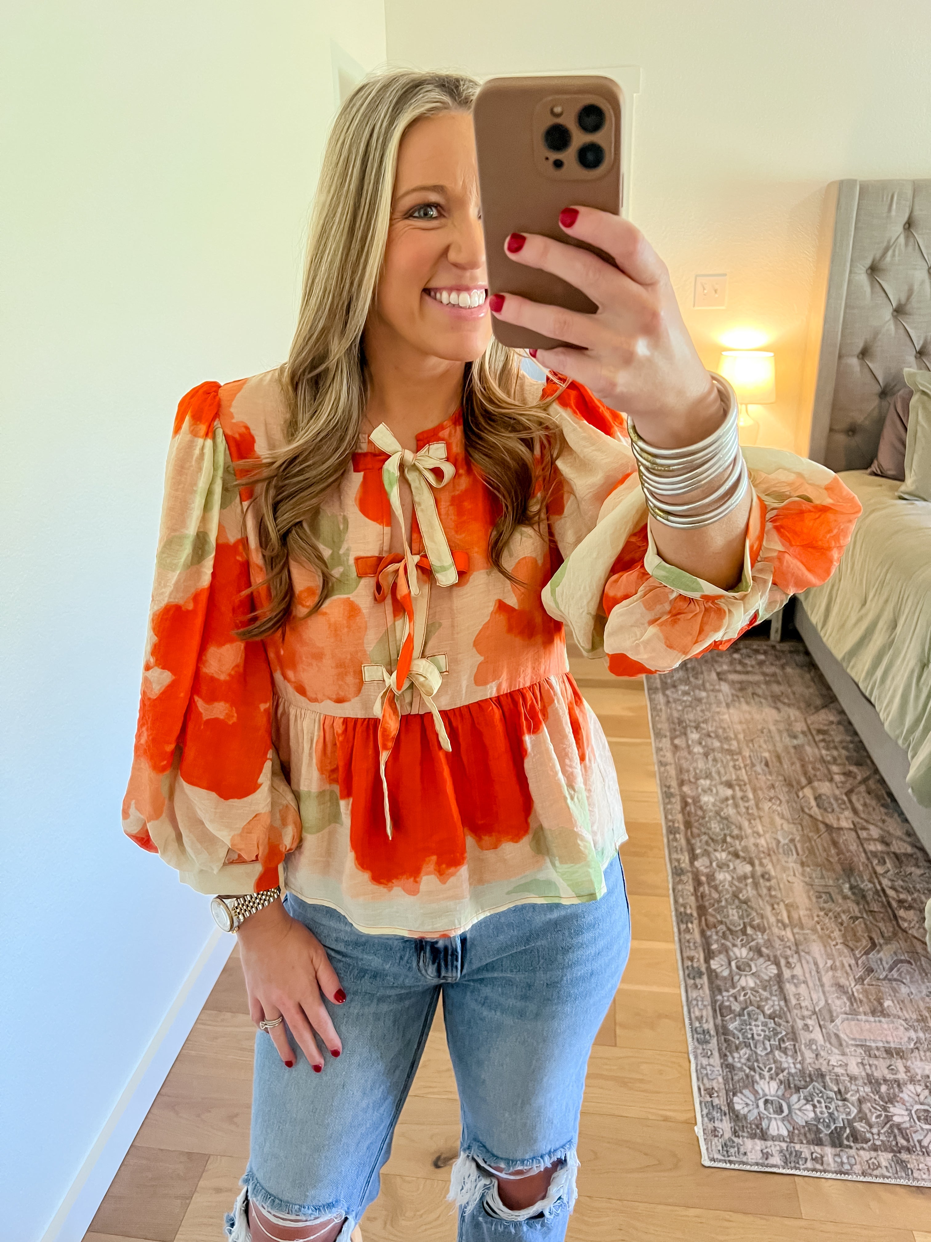 Orange floral peplum blouse
